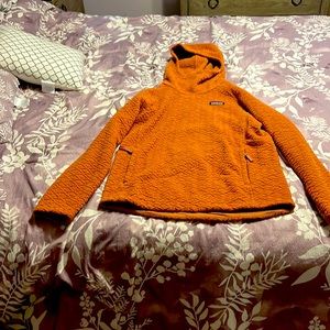 Rustic orange, Patagonia pull over.  Size small.  Excellent condition.